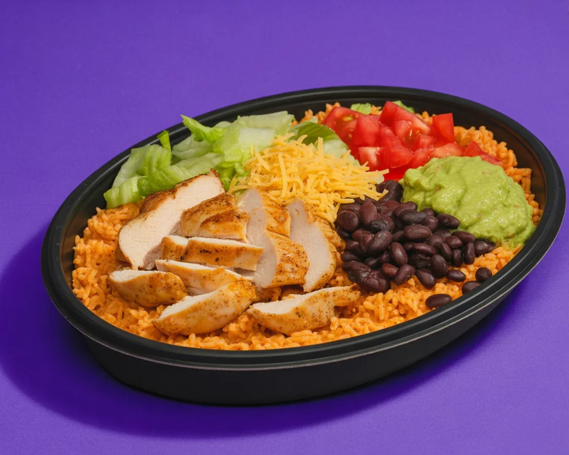 Power Menu Chicken Bowl from Taco Bell with chicken, rice, beans, and avocado ranch sauce