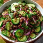 Spicy Korean ground beef served with a crisp cucumber salad.