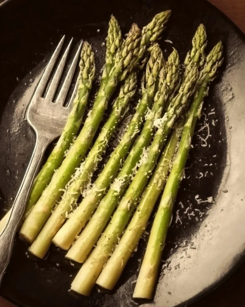 Delicious Asiago Roasted Asparagus garnished and ready to serve