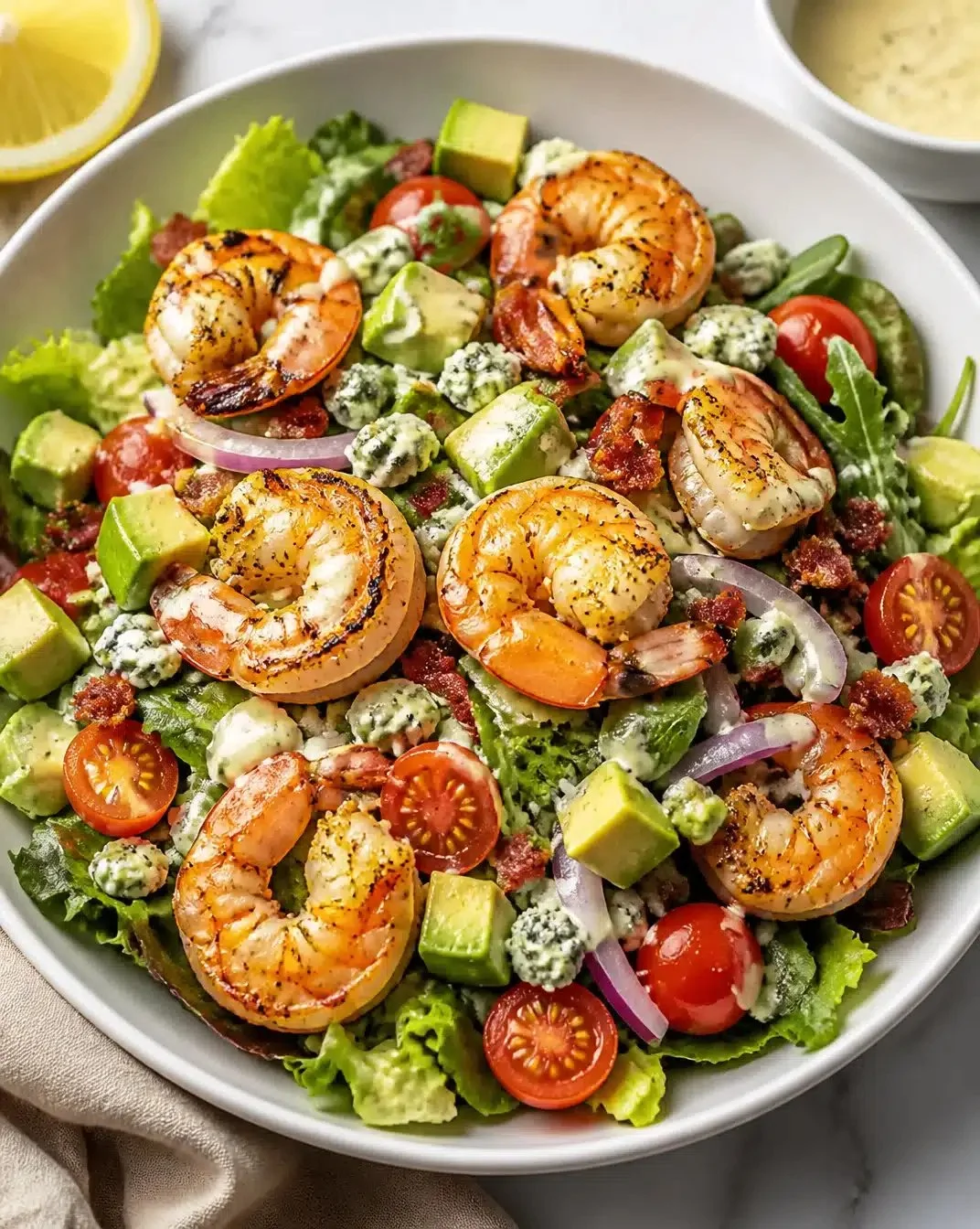Grilled Shrimp Cobb Salad Recipe 1 Grilled shrimp Cobb salad with fresh vegetables and dressing