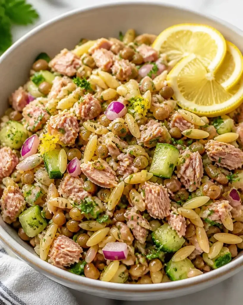 Tuna-Lentil Orzo Salad with Lemon Zest in a colorful bowl