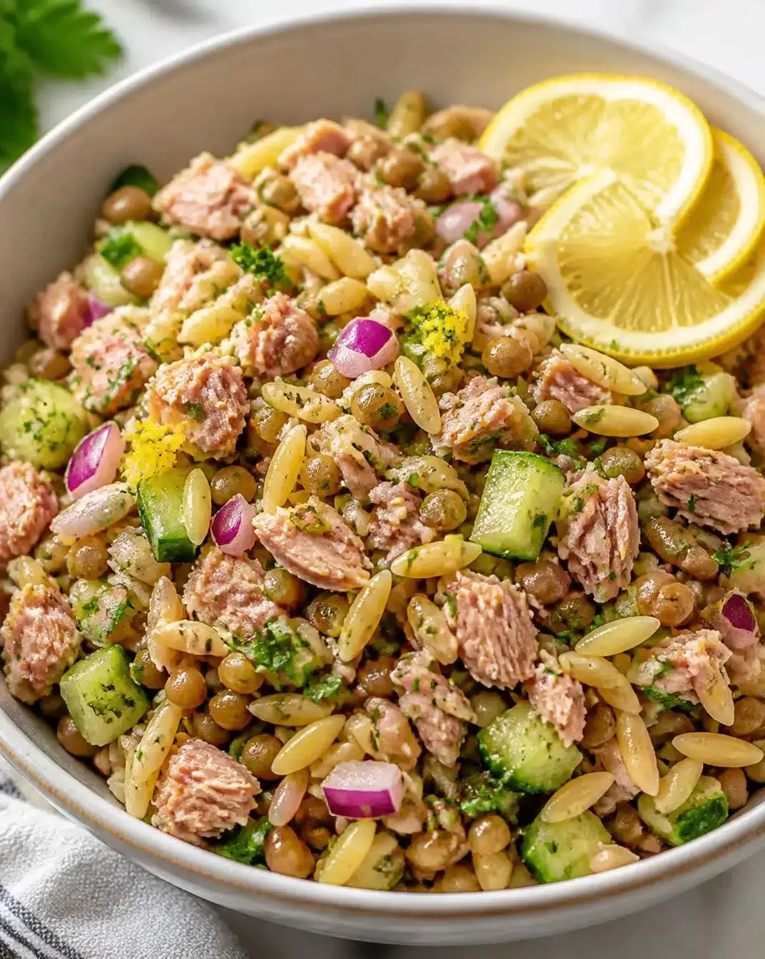 Tuna-Lentil Orzo Salad with Lemon Zest in a colorful bowl